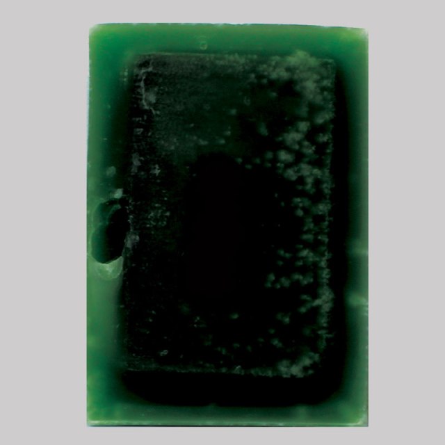 A5 green, 2012 found encyclopaedia, paraffin wax, dye 21cm x 15cm x 5cm 