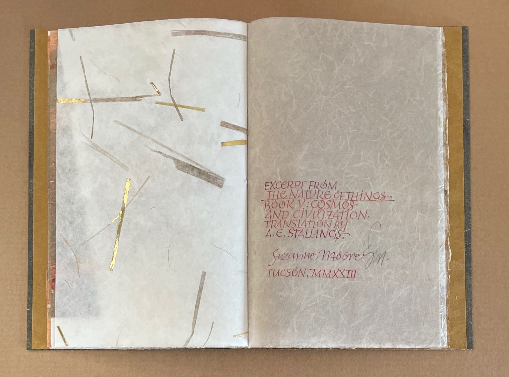 An open page of the artist's book _Amorous Embrace_ (2023) by Suzanne Moore, featuring translucent paper with gold leaf accents and a handwritten excerpt from Lucretius' _The Nature of Things_, translated by A.E. Stallings.