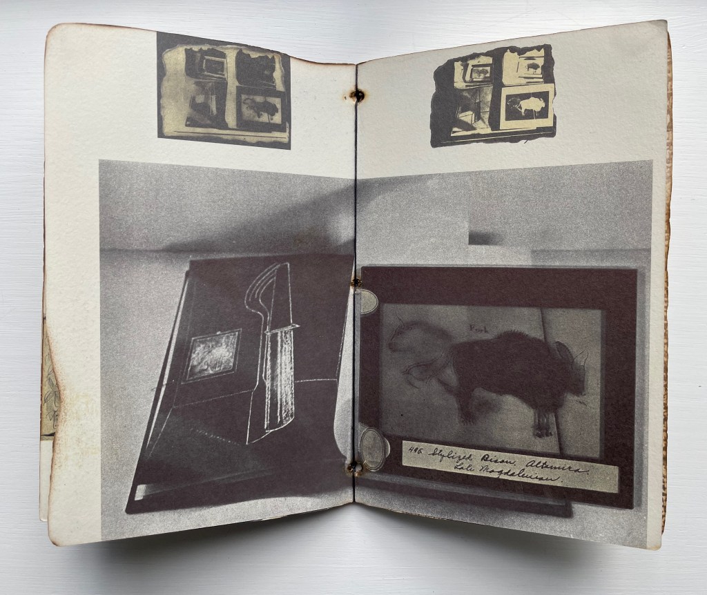 An open book showcasing two pages featuring black and white photographs and sketches, including images of framed artwork and detailed illustrations.