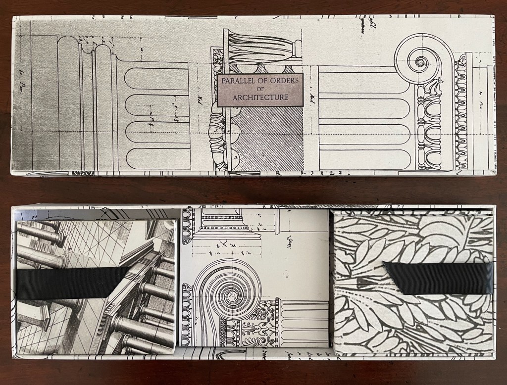 A decorative box featuring a design of architectural drawings, including columns and classical elements, with the title 'Parallel of Orders of Architecture' prominently displayed.
