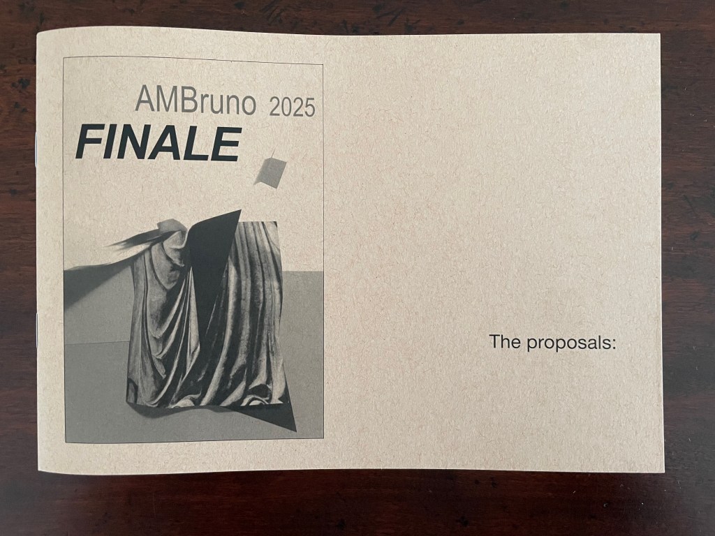 A promotional booklet cover featuring the text 'AMBruno 2025 FINALE' and an abstract image of draped fabric with a geometric shape, along with the phrase 'The proposals:'.