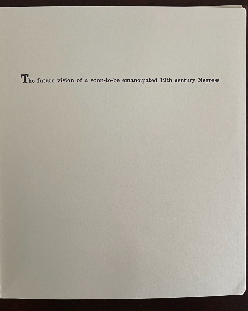 Text page featuring the phrase 'The future vision of a soon-to-be emancipated 19th century Negress.'