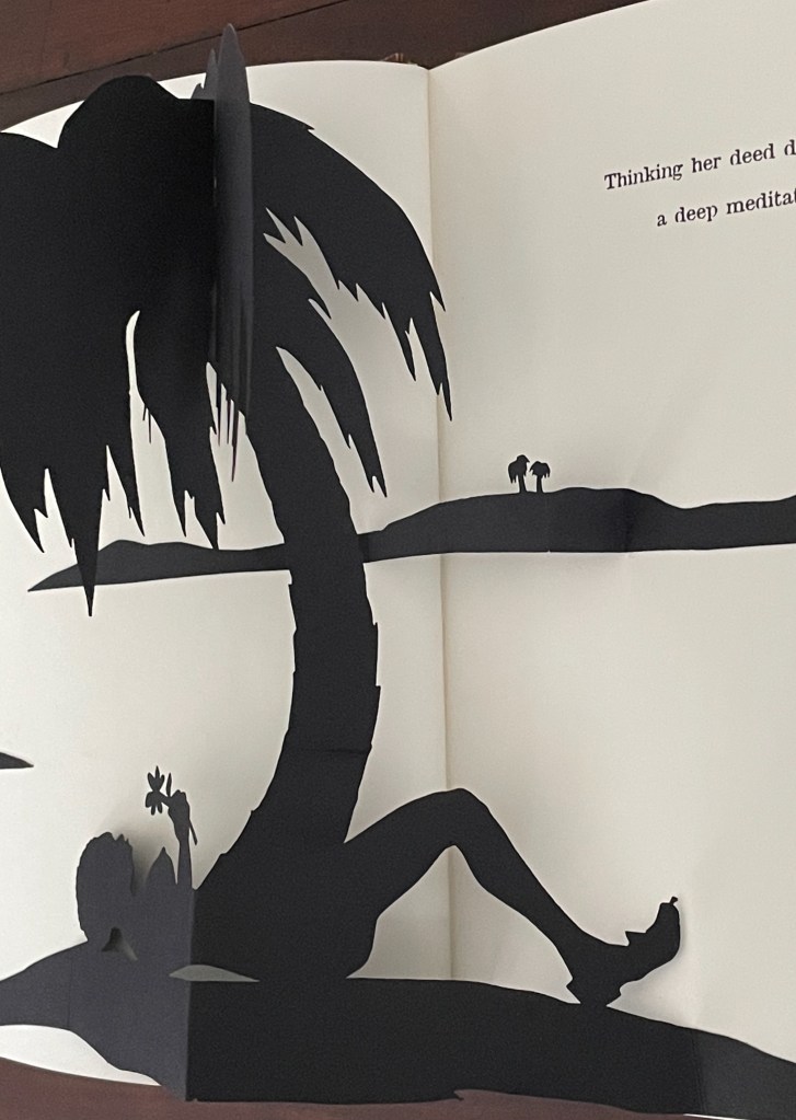 A pop-up book illustration featuring a silhouette of a person lying under a palm tree, with the text 'Thinking her deed a deep meditation' visible in the background.