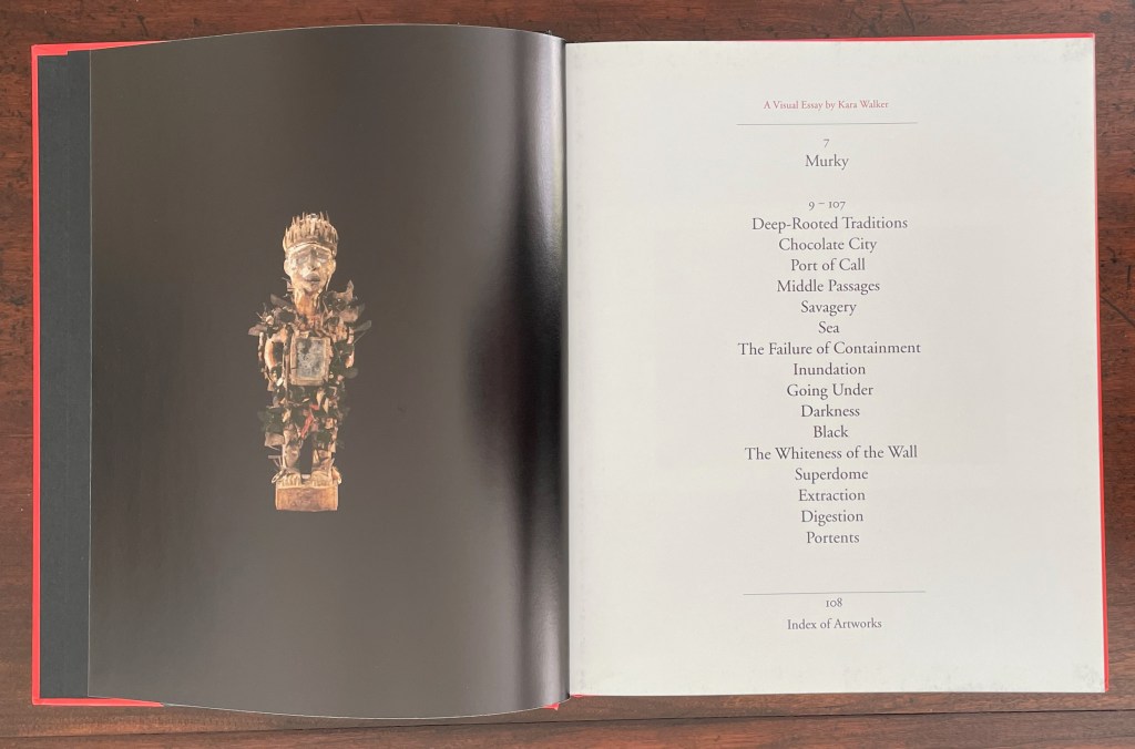 A visual essay by Kara Walker featuring a page with a sculpture on the left and text on the right, including a list of topics such as 'Deep-Rooted Traditions' and 'The Whiteness of the Wall.'