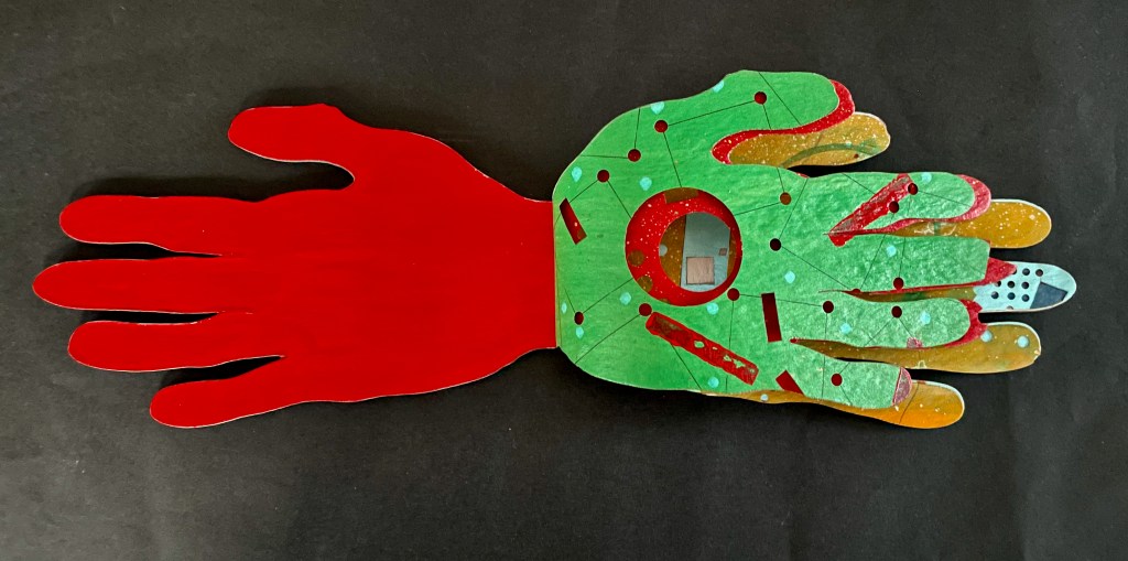 A colorful artistic representation of a hand, with one side painted red and the other side painted green with various patterns and markings, set against a black background.