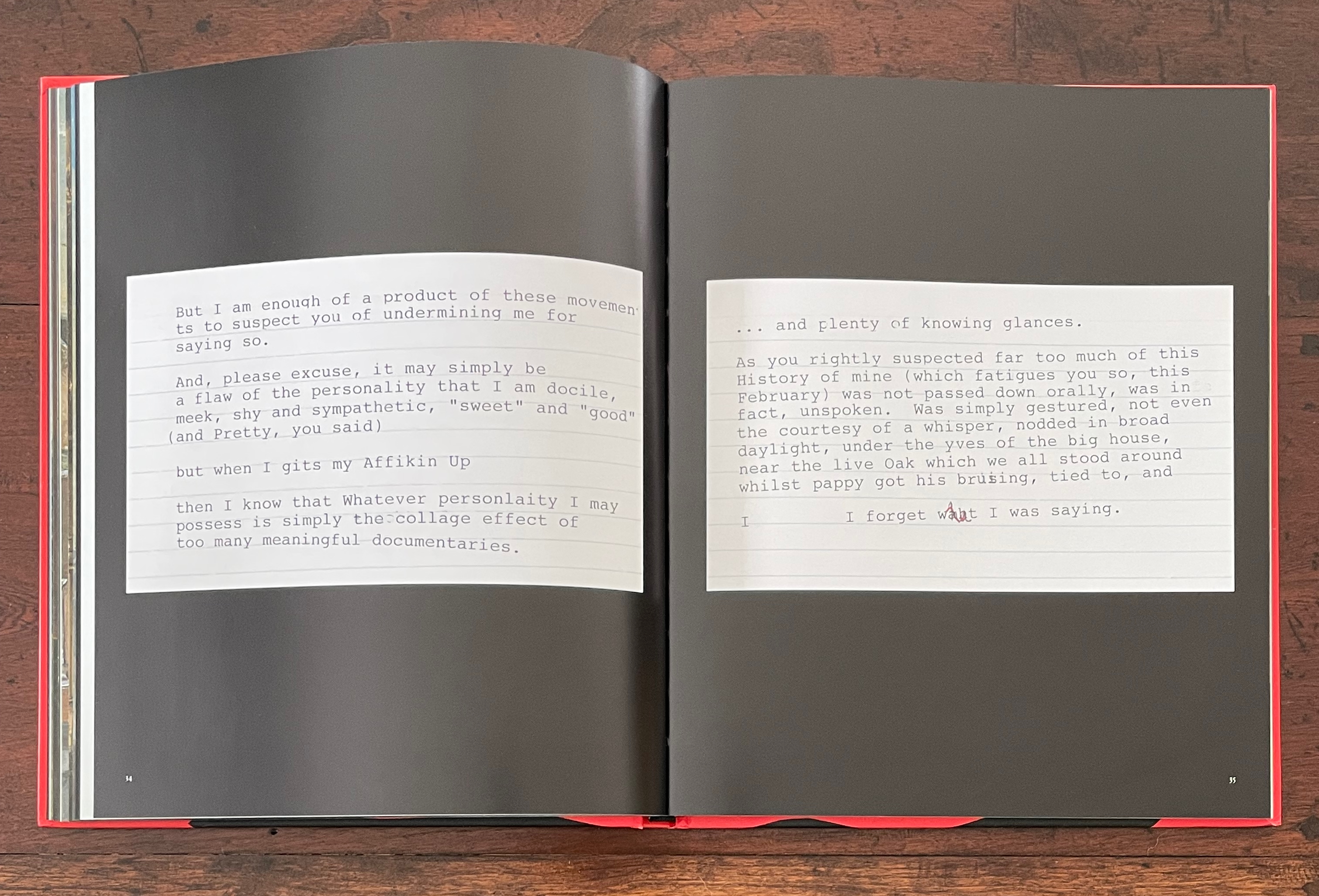 An open book displaying two pages of text written in a handwritten style on lined paper, discussing themes of personality and memory.