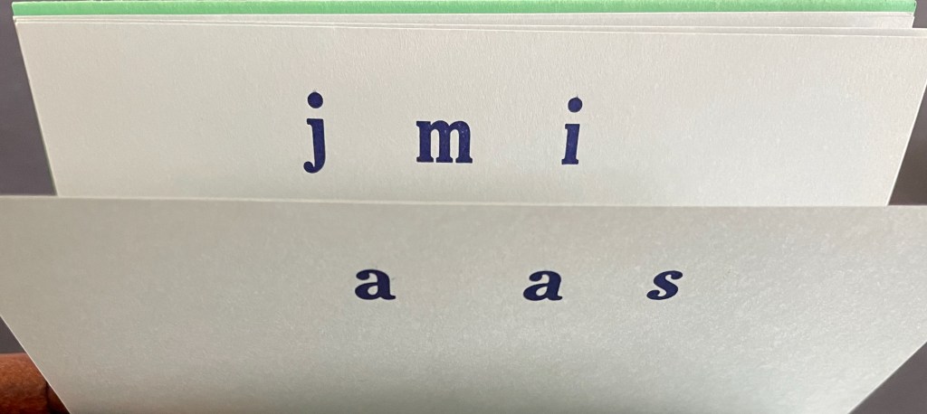 Image featuring letters arranged on a card: 'j', 'm', 'i', 'a', 'a', 's'.