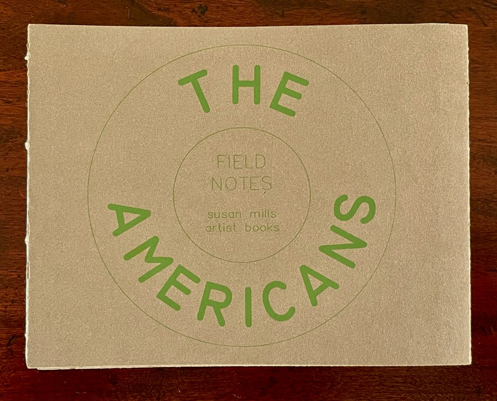 Cover of a book titled 'The Americans' featuring the subtitle 'Field Notes' and the author's name 'susan mills' in a circular layout.