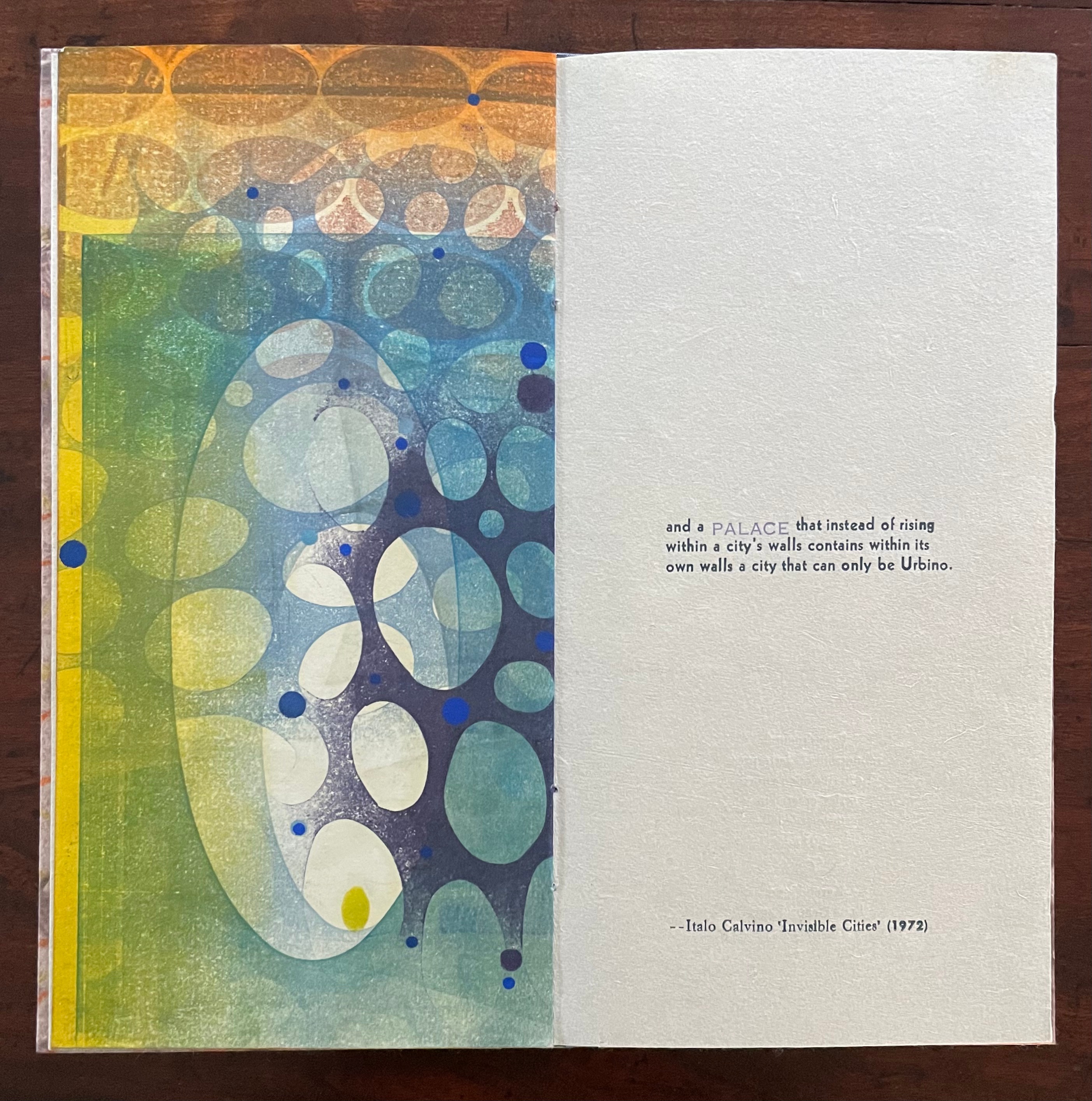 An artistic page featuring colorful abstract patterns alongside text from Italo Calvino's 'Invisible Cities' describing a palace that contains a city within its walls.