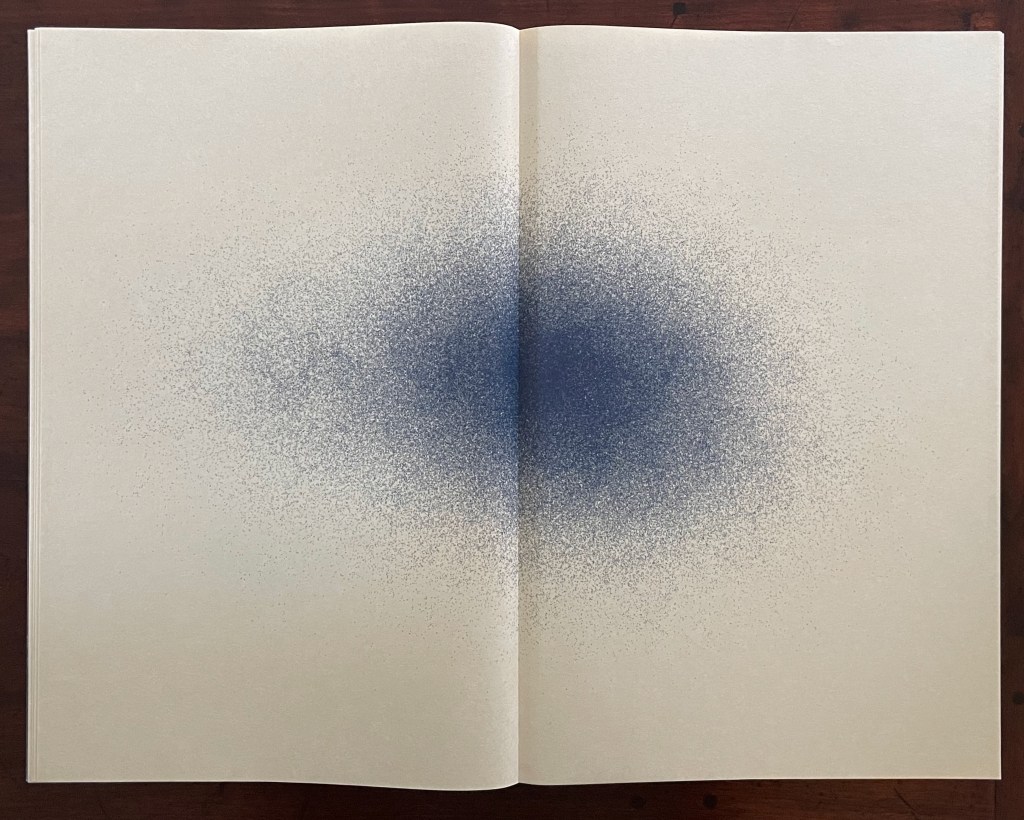 An open book displaying a gradient of blue dots creating a soft, textured effect on a light-colored page.