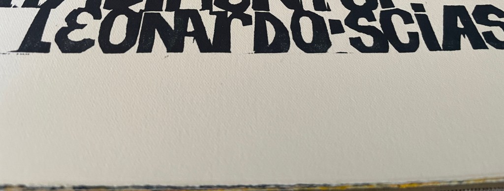 Close-up of the text 'LEONARDO'SCIAS' with a bold, black font on a light background.