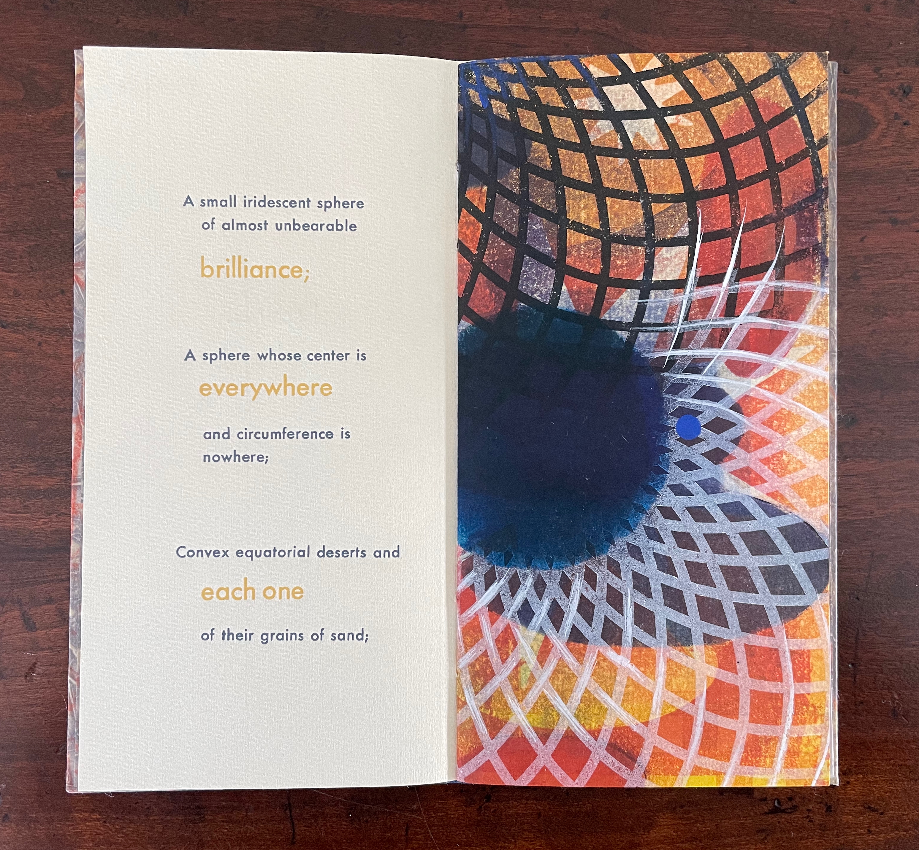 Open book page featuring colorful abstract artwork alongside text describing a sphere of brilliance and its attributes.
