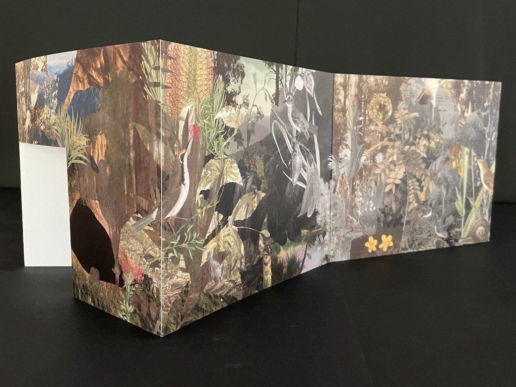 A three-dimensional art piece resembling a folded book, featuring intricate illustrations of nature, including plants and birds, with varying colors and textures. The background is dark, enhancing the vivid details of the artwork.