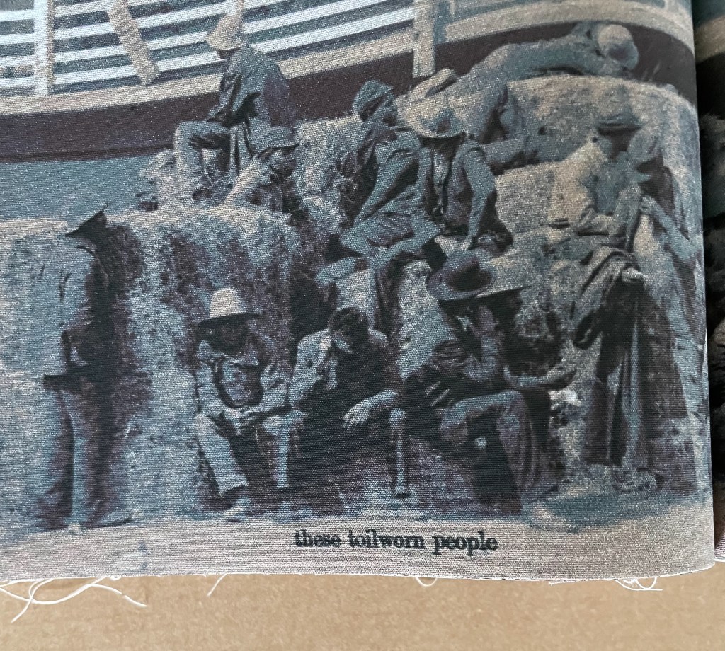 A black and white historical image of a group of weary individuals wearing hats, sitting and standing near a boat, with the caption 'these toilworn people' visible at the bottom.