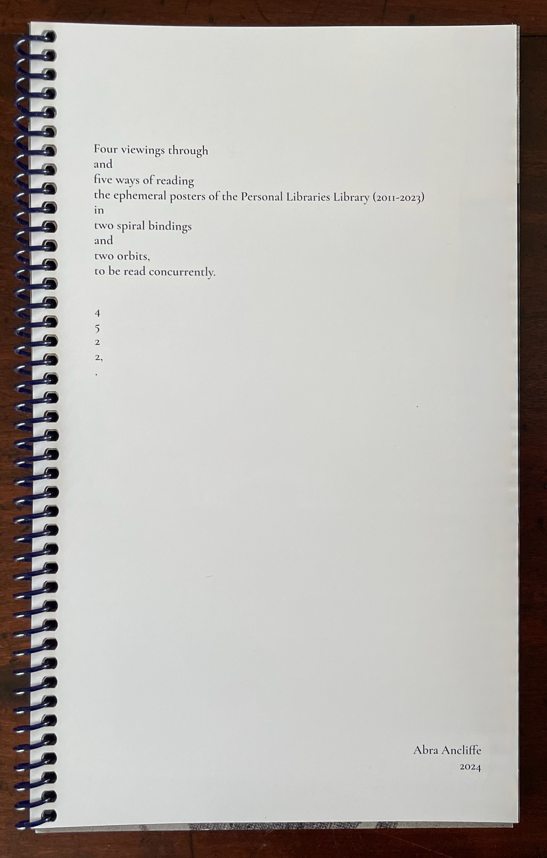 A spiral-bound book page featuring a title and text discussing views and ways of reading ephemeral posters from the Personal Libraries Library from 2011 to 2023, along with a list of numbers.