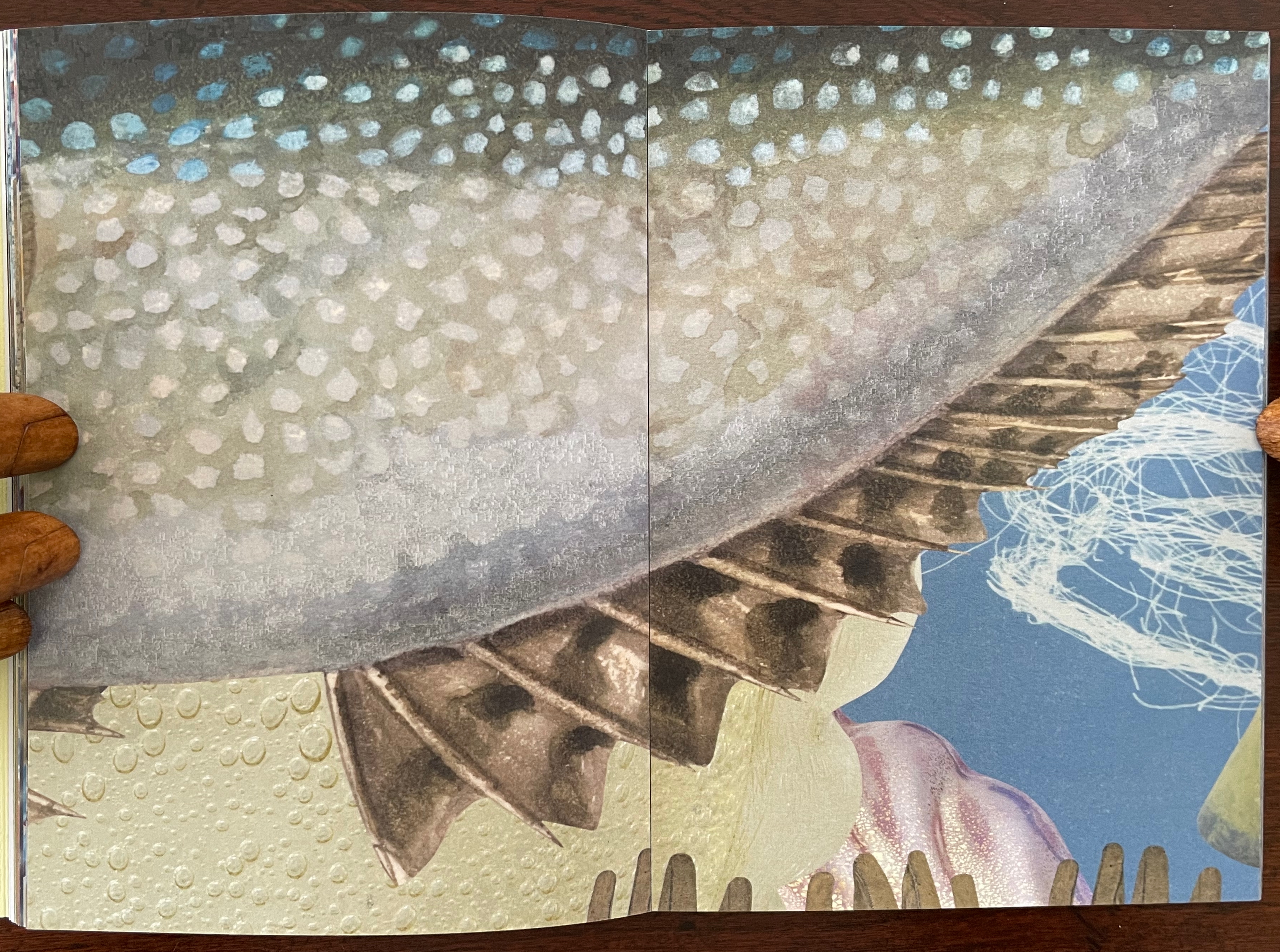 A close-up illustration of a fish's fin and body scales with a textured background, featuring soft colors and underwater elements.