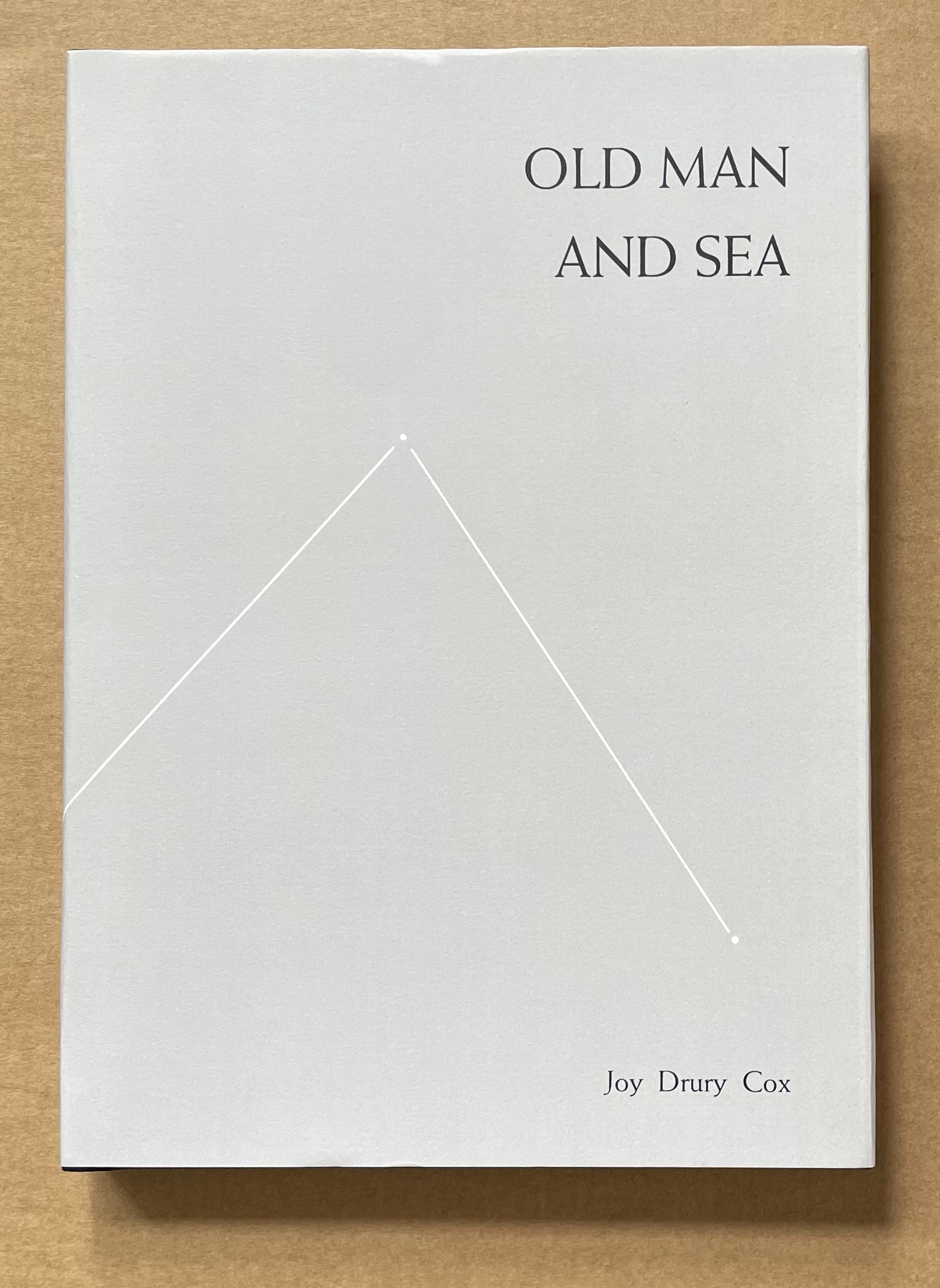 Cover of a book titled 'Old Man and Sea' by Joy Drury Cox, featuring a minimalist design with a gray background and a simple geometric shape.