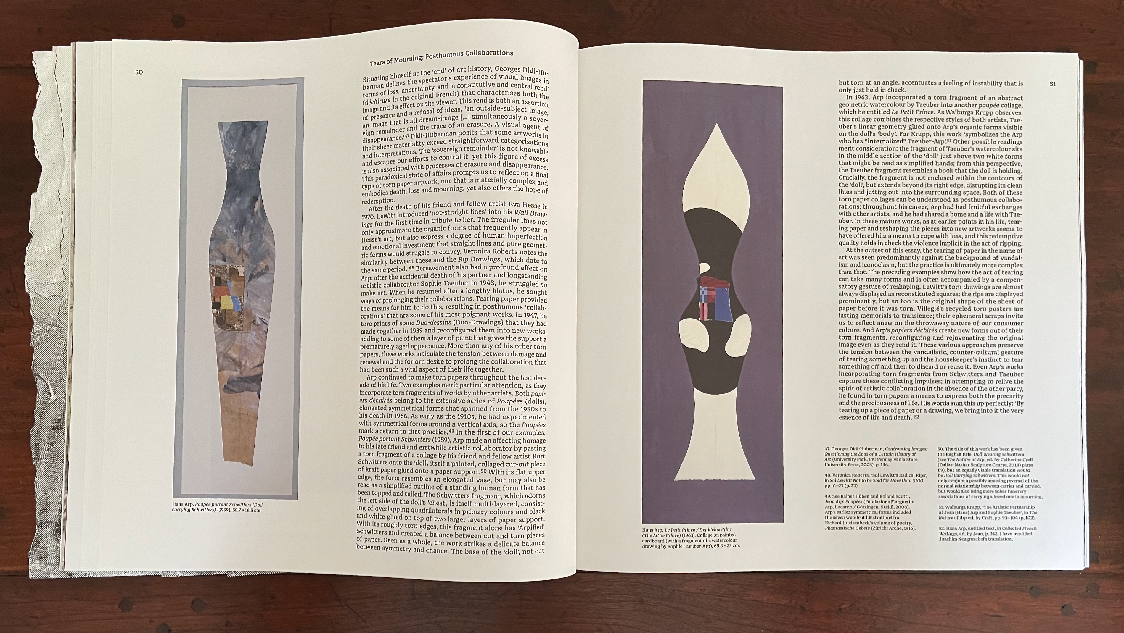 An open book page featuring two artistic works by Hans Arp, one resembling a slender figure with a geometric pattern and the other an abstract, torn form. Surrounding text discusses themes of loss and artistic collaboration in relation to the pieces.