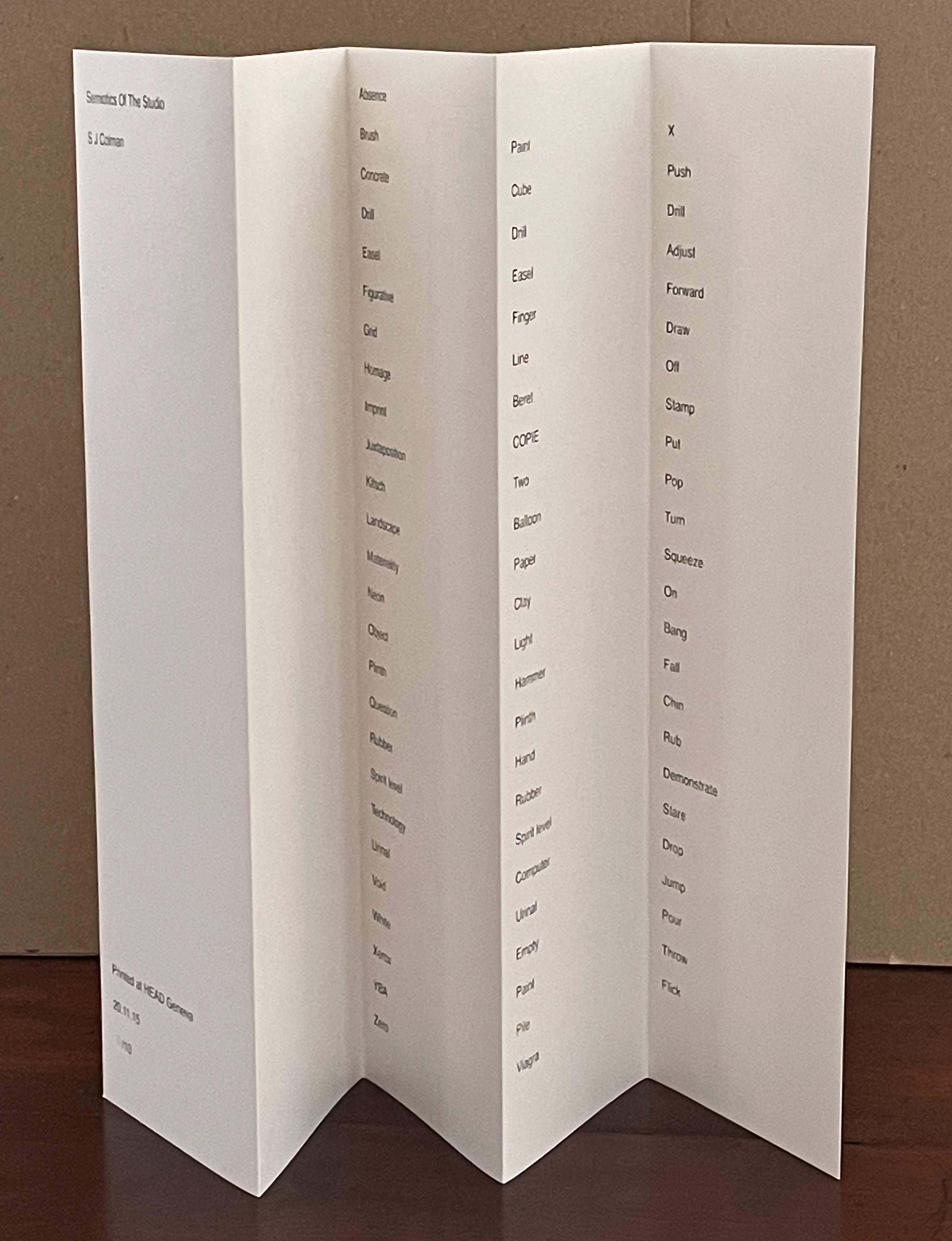 A folded booklet titled 'Symbols Of The Studio' by S.J. Cohan, displaying a list of words organized in a grid format.
