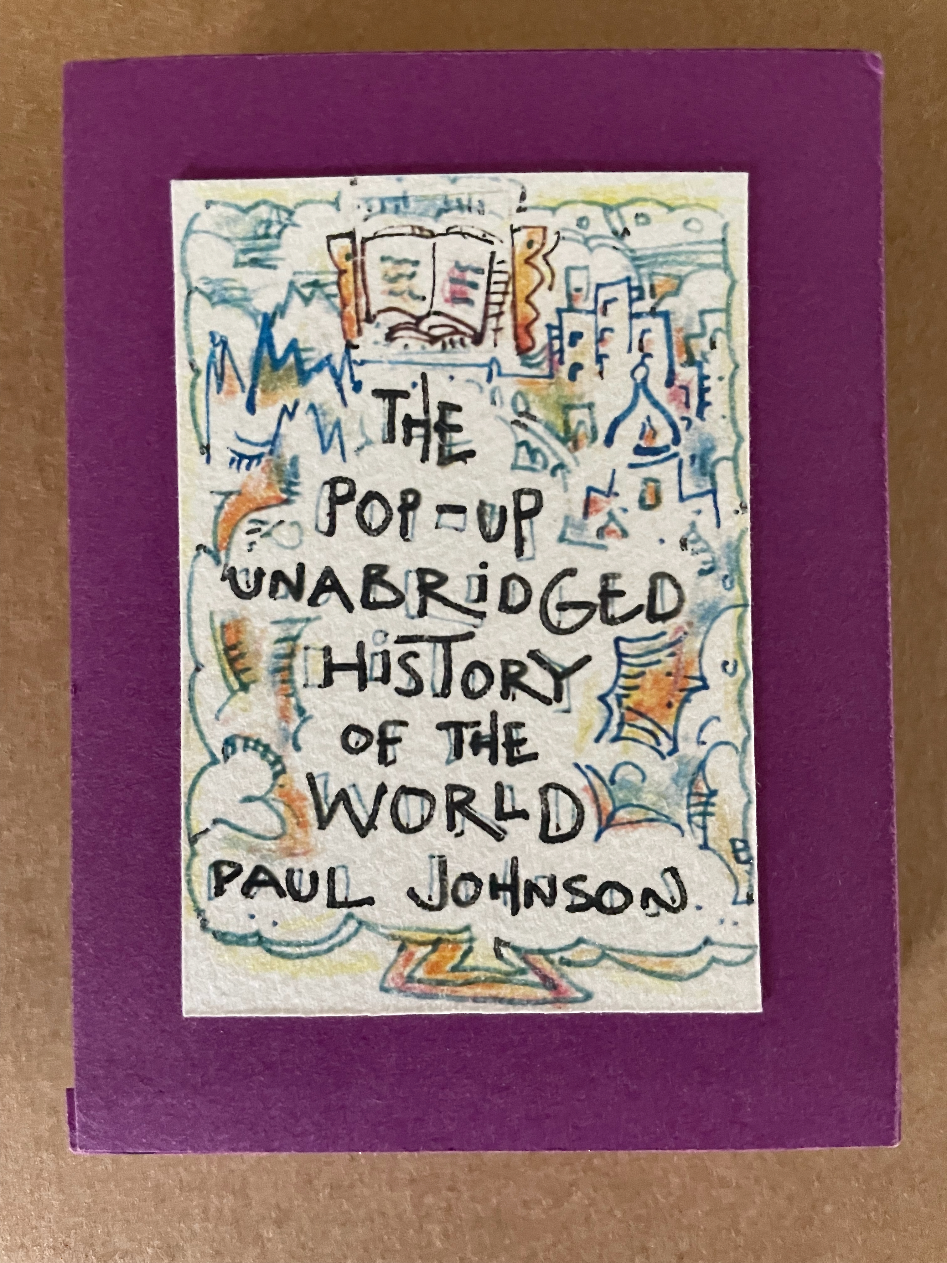 Cover of 'The Pop-Up Unabridged History of the World' by Paul Johnson, featuring colorful illustrations and a purple background.
