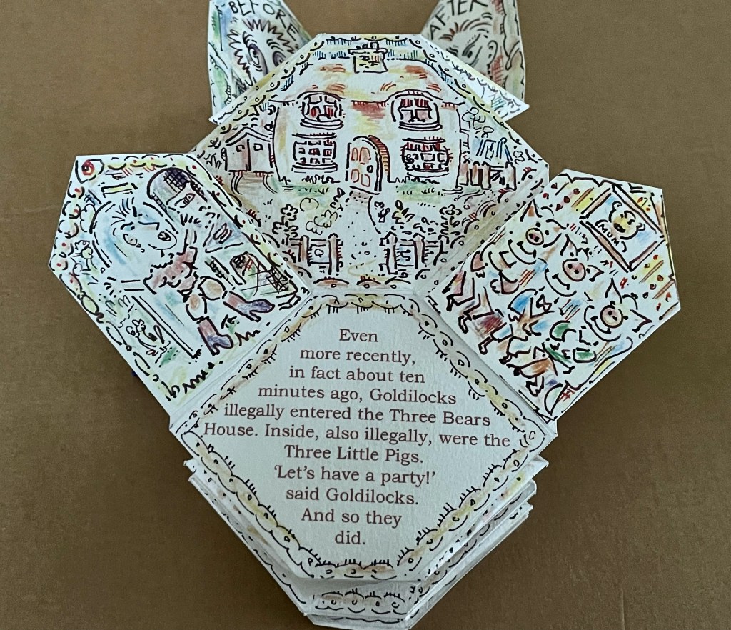 An intricate pop-up book page featuring illustrations of Goldilocks entering the Three Bears' house, surrounded by colorful drawings of characters and a caption discussing a party.