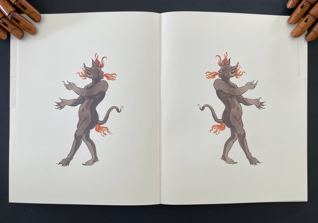 Illustration of a humanoid creature with fiery hair and a tail, depicted in a taunting pose, on an open book page.