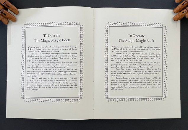 An open book titled 'To Operate The Magic Magic Book' featuring instructions on how to use it, with decorative borders and printed text visible on both pages.