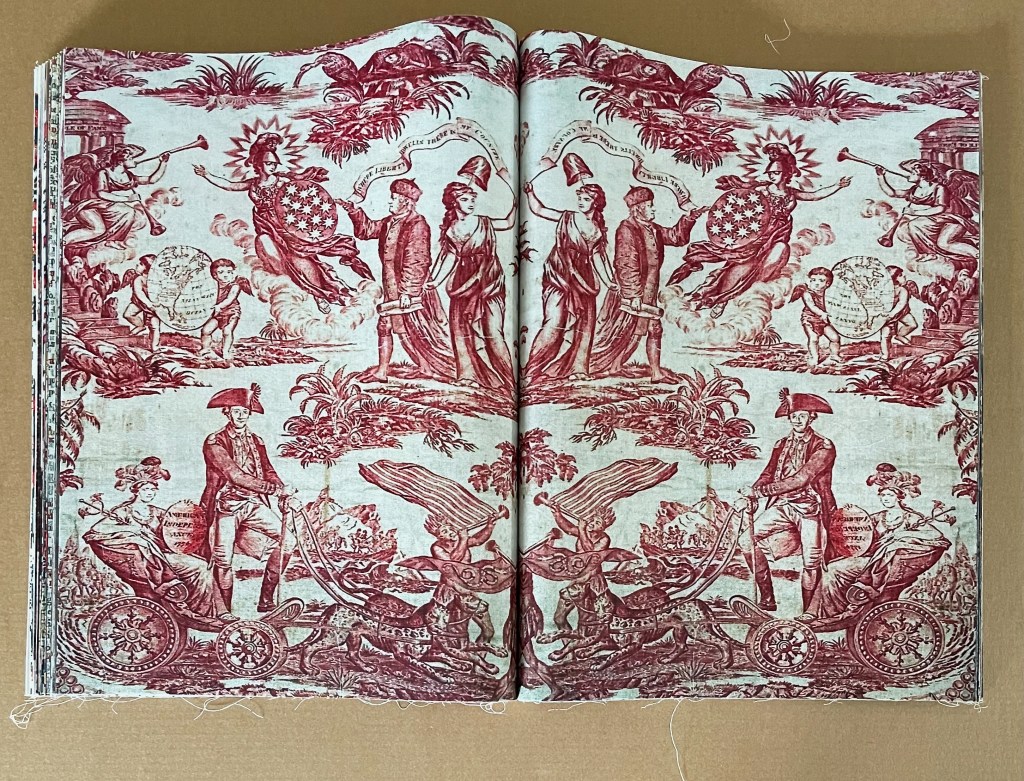 An open vintage book displaying intricate red illustrations depicting figures representing liberty, justice, and various allegorical scenes in a lush landscape.