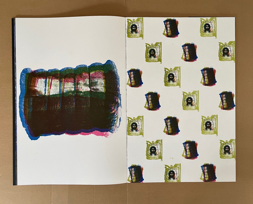 An open book displaying a colorful abstract design on the left page and a repeated graphic pattern on the right page.