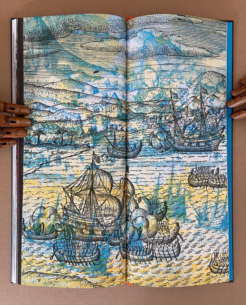 An open book displaying a colorful illustration of ships on water, surrounded by a coastal landscape with trees and hills.