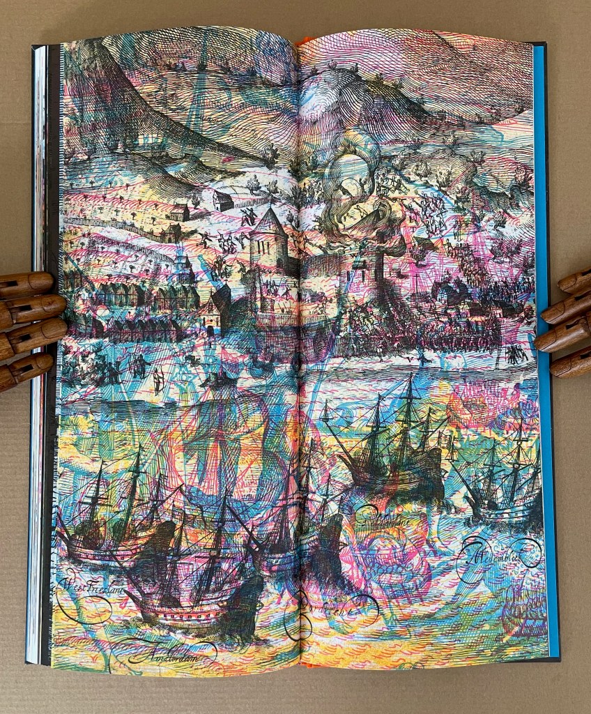 An open illustrated book featuring a colorful, intricate drawing of a coastal scene depicting ships, mountains, and towns, with a vibrant use of colors and patterns.