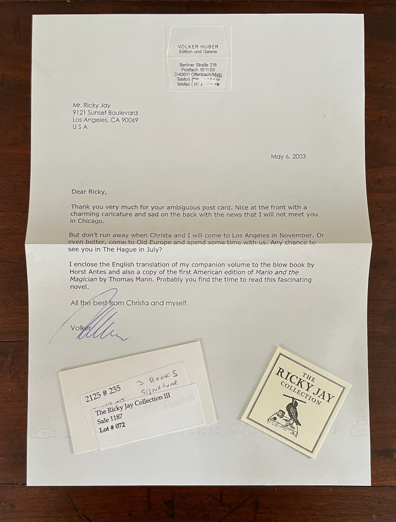 A handwritten letter addressed to Mr. Ricky Jay, dated May 6, 2003, from Volker Huber, expressing gratitude for a post card and discussing upcoming visits. Below the letter are two items: a small card related to 'The Ricky Jay Collection' and another card labeled with details about a sale.