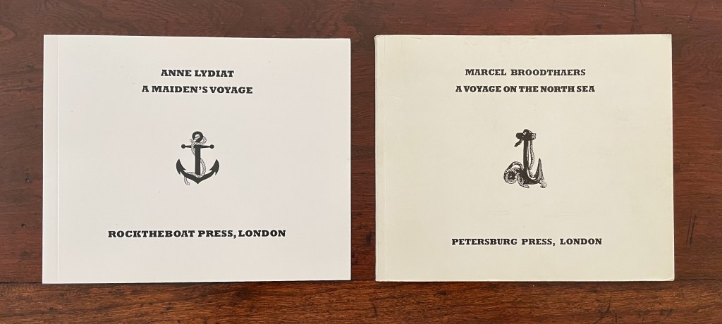 Two art books displayed side by side. The left book is titled 'A Maiden's Voyage' by Anne Lydiat, published by Rocktheboat Press, London, featuring an anchor illustration. The right book is titled 'A Voyage on the North Sea' by Marcel Broodthaers, published by Petersburg Press, London, featuring a nautical illustration.