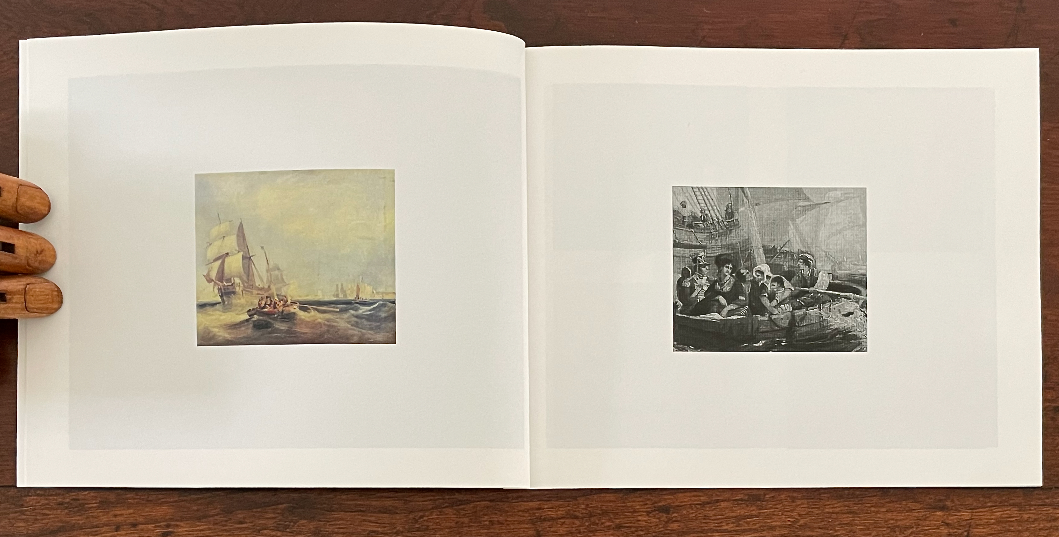 An open book displaying two pages: on the left, a colorful painting of ships sailing in rough waters, and on the right, a black-and-white illustration featuring a group of people in a small boat, surrounded by sails.