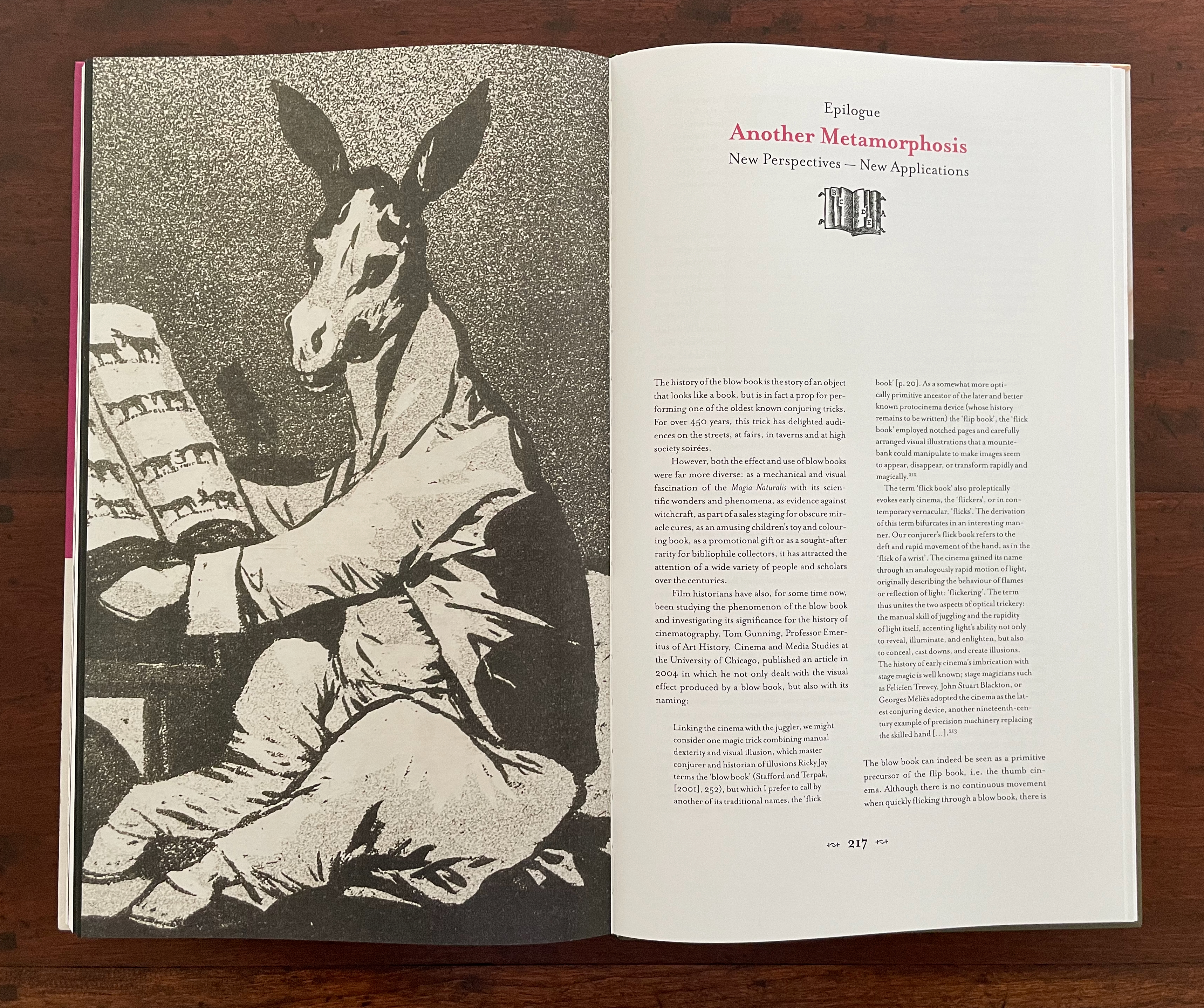 A black-and-white illustration of a donkey with human features, wearing a coat, sitting at a piano and reading sheet music, alongside text from an epilogue discussing new perspectives on a topic.