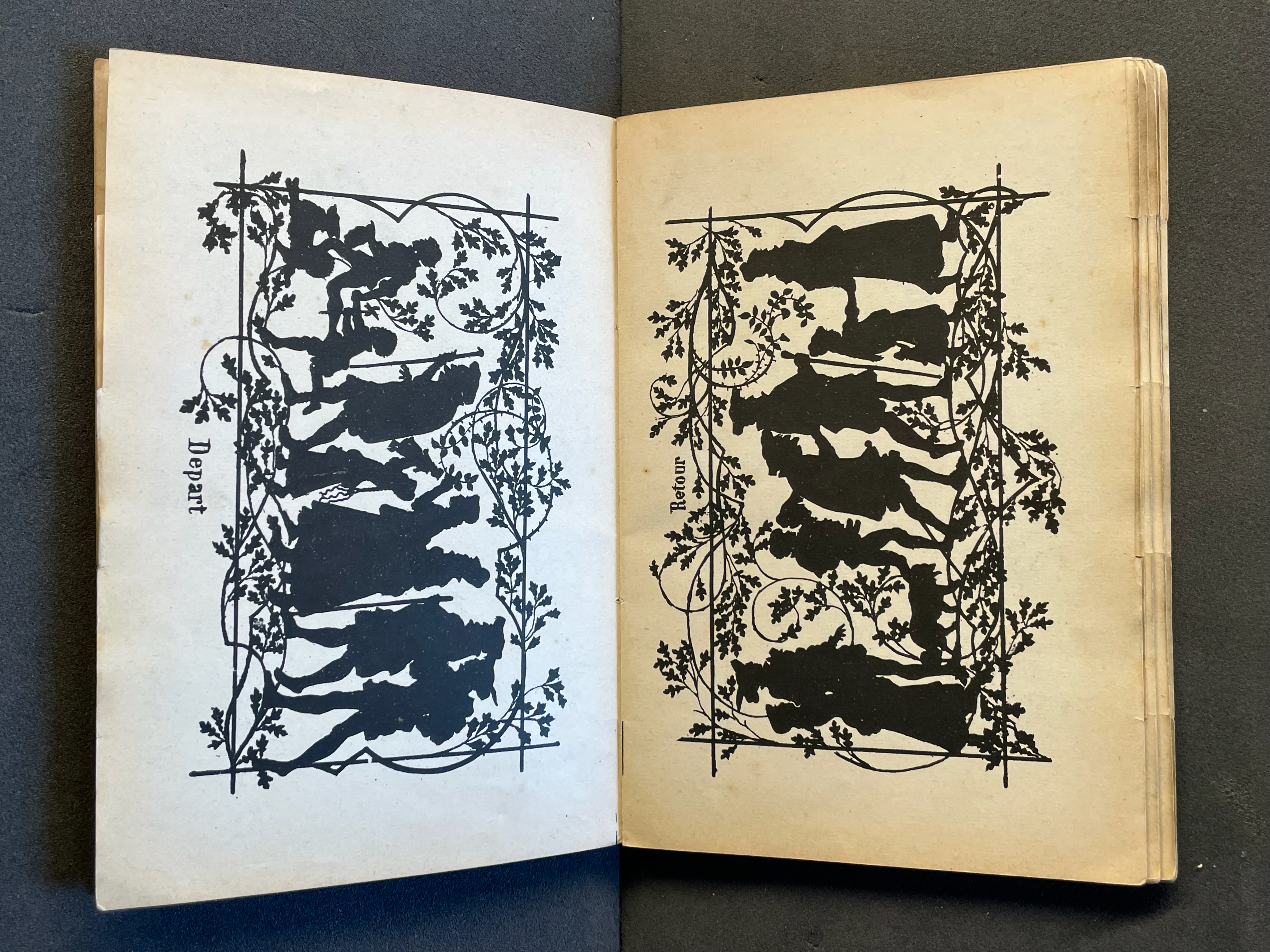 Open book with silhouettes of figures on each page, framed by ornamental vines. One page labeled 'Depart' and the other 'Retour'.